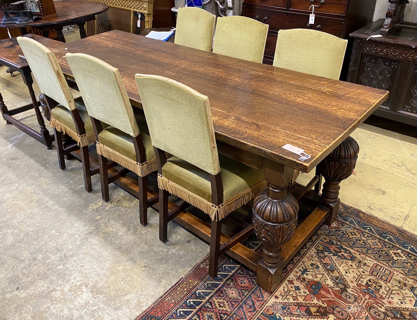 An 18th century style rectangular oak refectory table, length 198cm, depth 75cm, height 76cm and six chairs